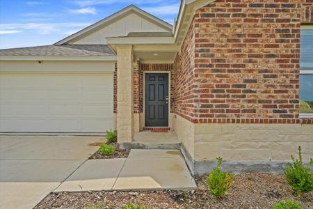 Entrance to property with a garage