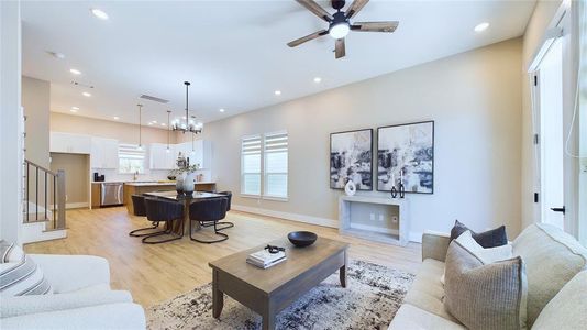 Seamlessly connecting the kitchen, dining, and living areas, this open floor plan allows for a natural flow that’s perfect for modern living.