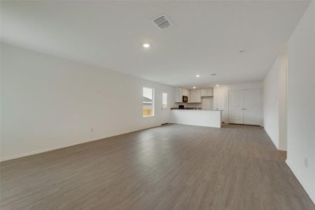 Unfurnished living room featuring light hardwood / wood-style flooring