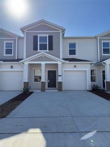 New construction Townhouse house 2950 Savoir Avenue, Davenport, FL 33837 - photo 0