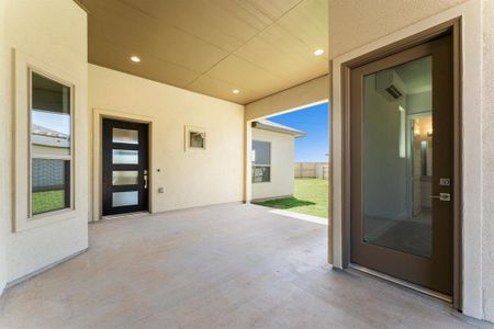 Casita Entry and Covered Patio to Entry of Main House.