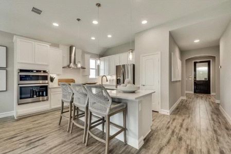 Photo of Pulte model home with same floor plan, not of actual home listed.