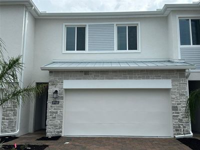 New construction Townhouse house 8968 Swing Lane, Davenport, FL 33896 - photo 0