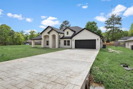 New construction Single-Family house 69 County Road 3668, Splendora, TX 77372 - photo 0