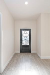 Foyer entrance featuring light wood-type flooring