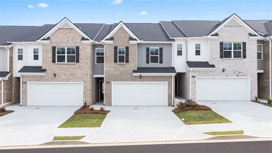 New construction Townhouse house 2718 Honey Locust Court, Loganville, GA 30052 Stratford- photo 0