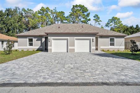 New construction Duplex house 11 Providence Ln, Palm Coast, FL 32164 - photo 0