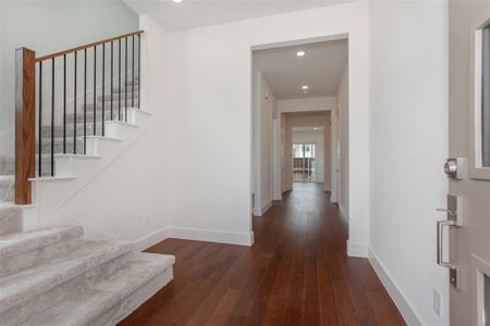 Hall featuring dark hardwood / wood-style floors