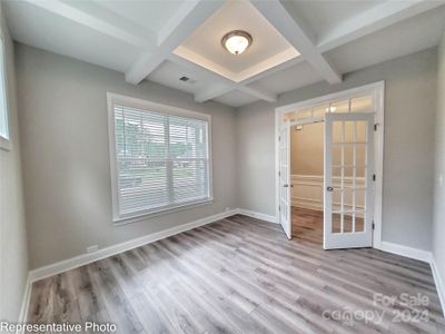 This home features alternate kitchen with formal dining ilo study