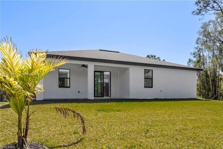 New construction Single-Family house 821 Newell St E, Lehigh Acres, FL 33974 - image