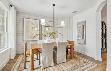 Formal dining room off entry