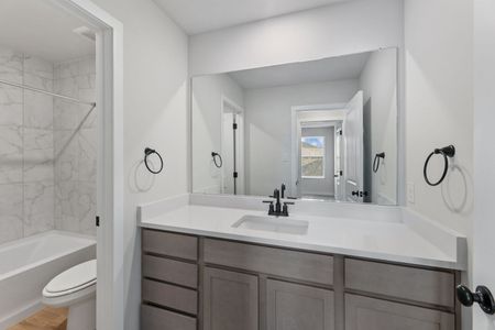 New construction Single-Family house 16403 Maple Pear, Elmendorf, TX 78112 plan Poinsettia - image 9