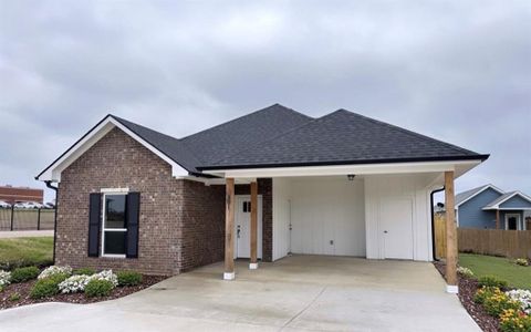 View of front of house featuring a carport