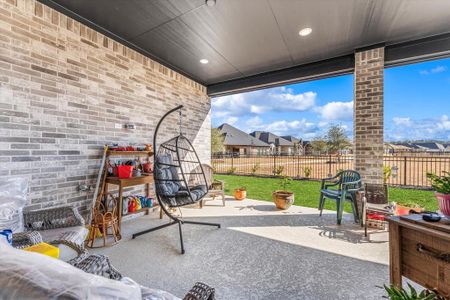 Extended patio with knockdown texture and sealant, no rear or side neighbors