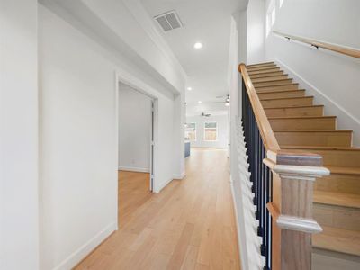 The enclosed dining room offers versatility, serving as either a traditional dining space or a dedicated study for those working from home. (Sample photos of a completed Bordeaux floor plan. The image may feature alternative selections and/or upgrades.)