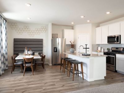 Dining area is open to the kitchen for easy access.