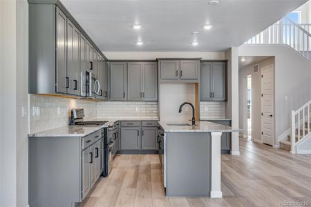 New construction Single-Family house 9973 Worchester St, Commerce City, CO 80022 Plan 4036- photo 5 5