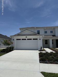 New construction Townhouse house 34 Mulberry Rd, Palm Coast, FL 32164 Woodlawn Elite- photo 0