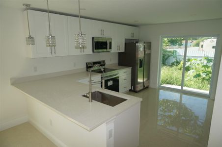 New construction Single-Family house 5584 Papaya Rd, West Palm Beach, FL 33413 - photo 0