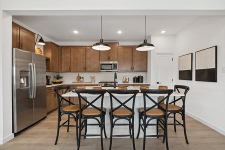 Kitchen with pendant lighting and floating shelves