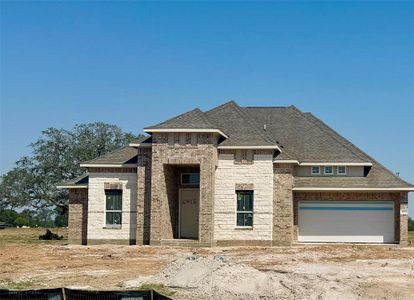 One-story home with 4 bedrooms, 3 baths and 3 car tandem garage