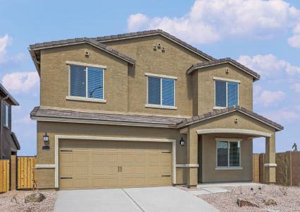 Angled exterior of the Thatcher with a two-car garage and desert landscaping.