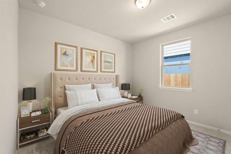 Your secondary bedroom features plush carpet, fresh paint, closet, and a large window that lets in plenty of natural lighting.