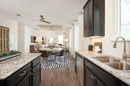 Photo of Pulte model home with same floor plan, not of actual home listed.