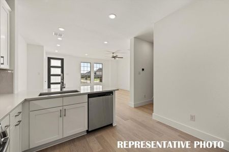 Lovely neutral color pallette paired with modern stainless steel create the kitchen of your dreams! REPRESENTATIVE PHOTO