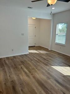 Living room featuring wood-style flooring