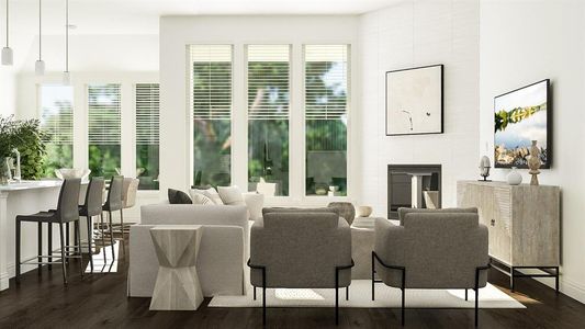 Living room with a healthy amount of sunlight, dark hardwood / wood-style flooring, and a tile fireplace