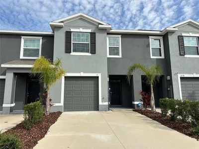 New construction Townhouse house 32174 Turtle Grace Loop, Wesley Chapel, FL 33545 - photo 0