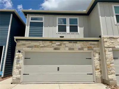New construction Townhouse house 12802 Siena Village Ln, Buda, TX 78610 The Bonnell (162)- photo 0