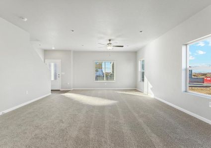 The family room has a lot of natural light.