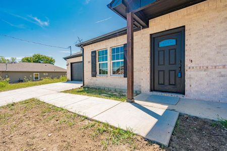 Entrance to property featuring a garage