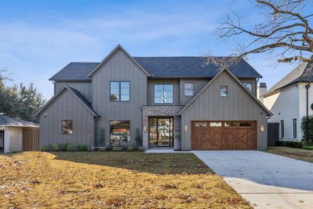 Modern farmhouse featuring a garage