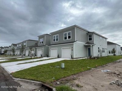 New construction Townhouse house 14467 Macadamia Ln, Unit 323, Jacksonville, FL 32218 Crescent- photo 1 1