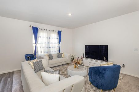 Living room with wood-type flooring