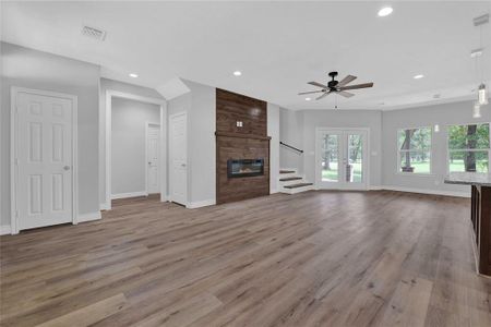 Open floor plan with gorgeous vinyl plank flooring throughout main areas of home!