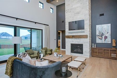 Another view of living room. Photo from model home.