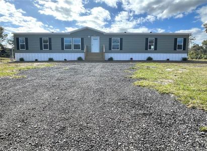 New construction Manufactured Home house 9018 Atlas Drive, Saint Cloud, FL 34773 - photo 0