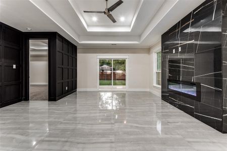 Breathtaking Living Room with upgraded tiles, double boxed ceiling!