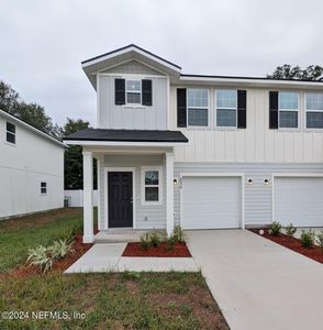 New construction Townhouse house 6036 Carolines Court, Jacksonville, FL 32277 - photo 0