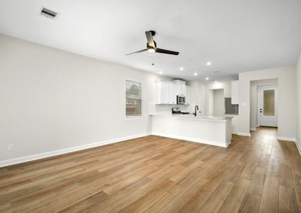 The family room and adjoining kitchen