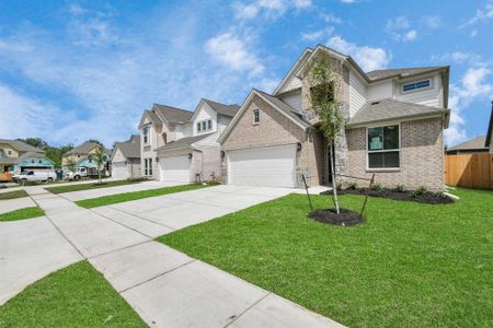 Sample photo of completed home with similar plan. As built color and selections may vary.