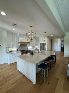 Builder Kitchen remodel, similar to the kitchen in this home.