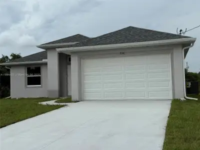 New construction Single-Family house 306 Lenz Ave S, Lehigh Acres, FL 33974 - image