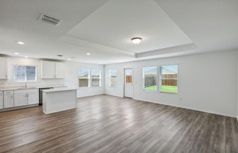 Expansive gathering room with tray window *real home pictured