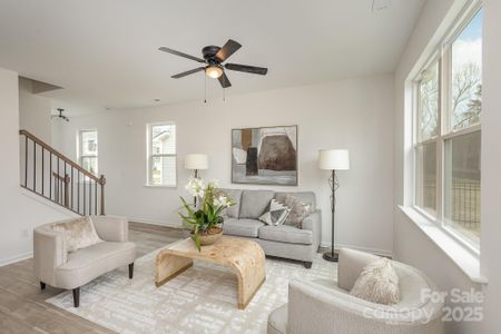 Vinyl plank flooring throughout first floor. Representative Photo