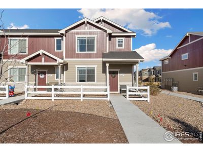 New construction Townhouse house 247 Molinar St, Johnstown, CO 80534 - photo 0